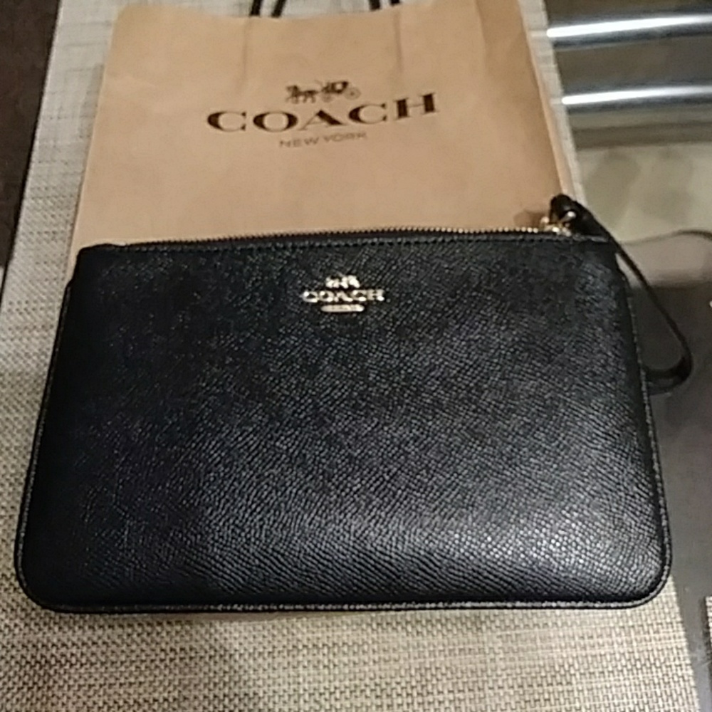 Simple black wallet or clutch